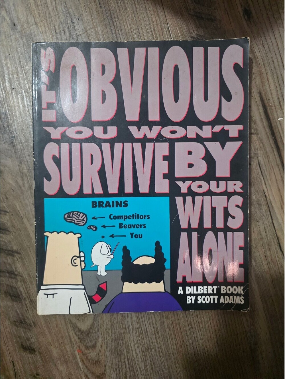 Dilbert Book: It's Obvious You Won't Survive By Your Wits Alone by Scott Adams
